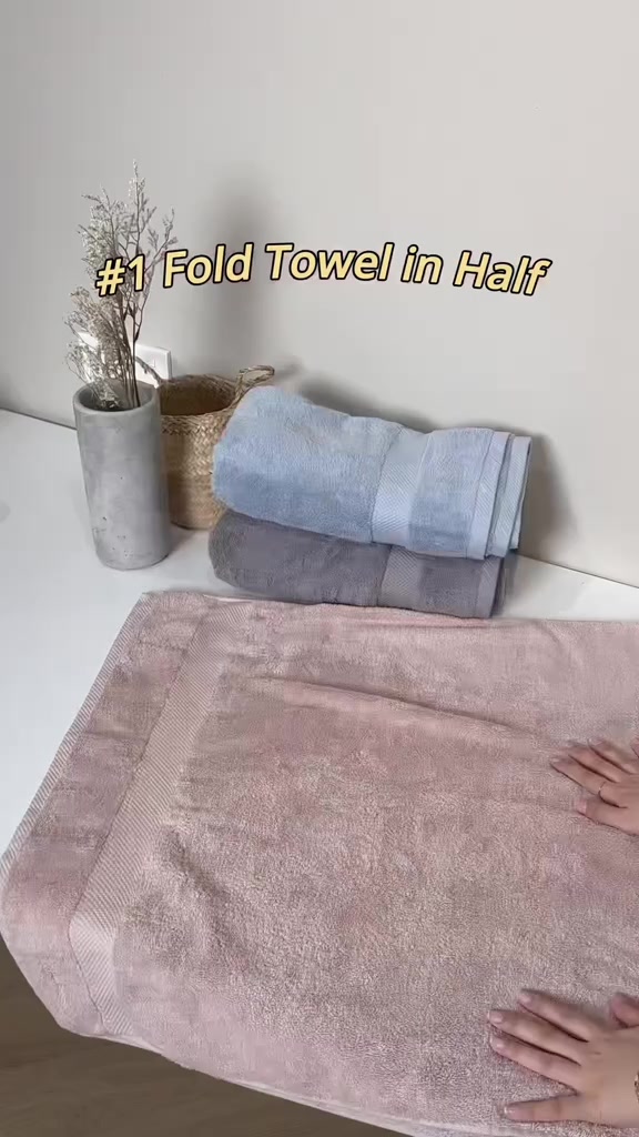 EXPOSED 🤫  This is how hotels roll their towels! Featured: ✨Kapas LUXE Towels #kapasliving #hotelhack #towelfold #simplehack #bathessentials